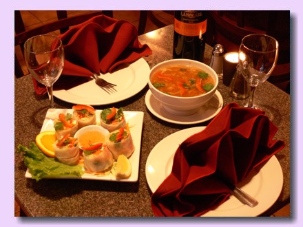 Bow Thai table with soup and appetizer.